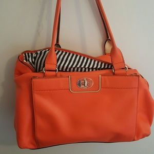 Kate Spade Purse- it is a well worn item.